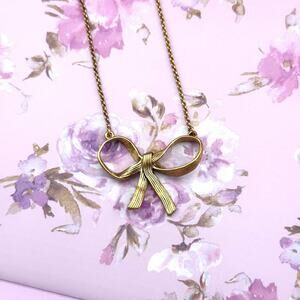 Juicy Couture Pendant Bow  Antiqued Gold Ribbon Signed Necklace